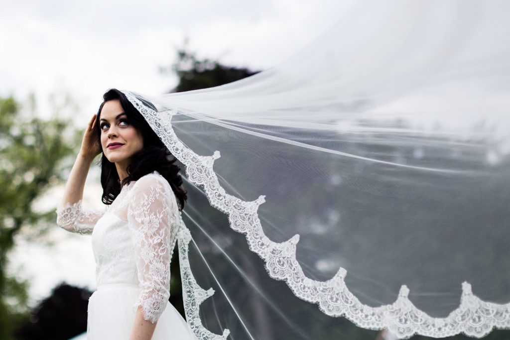 JAGstudios Photography | Worlds Best Wedding | Wedding Dress With long Lace Veil